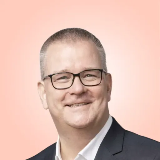 Portrait of Martin Lage professional headshot with neutral background