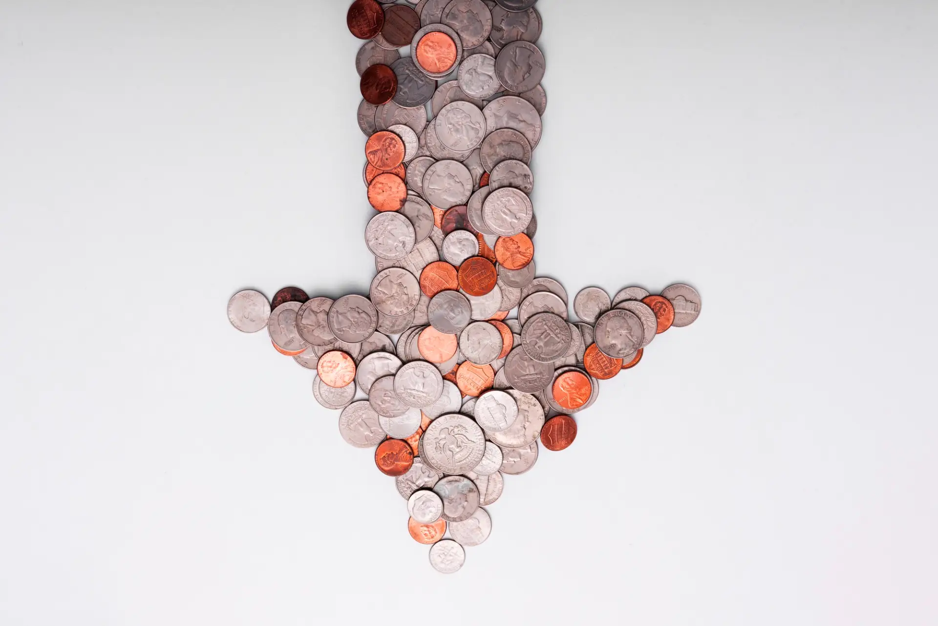 Arrow made of money representing negative revenue.