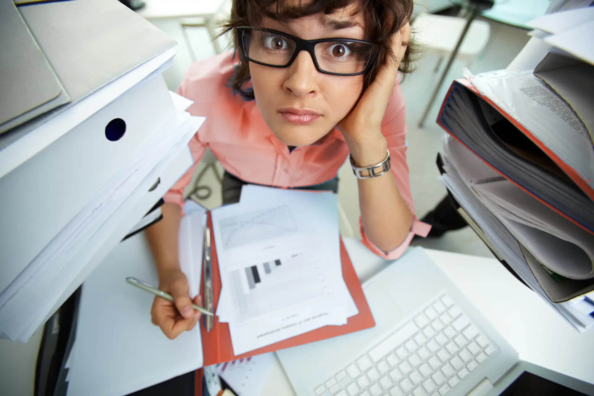 Women getting lost in document chaos.