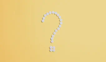 Pills Fixed as Question Mark Sign