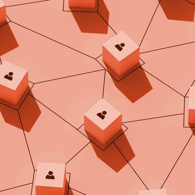 Orange cubes with person icons connected by lines in a network.