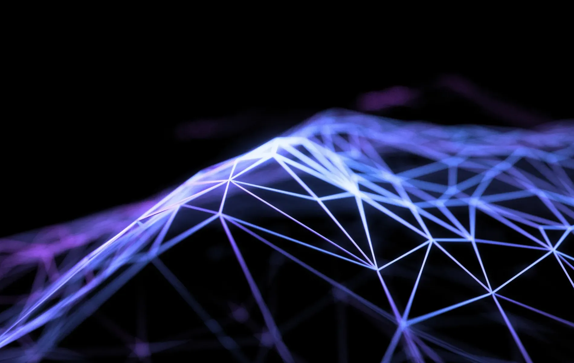 Abstract polygonal network structure in blue and purple symbolizing digital connectivity, data, and blockchain technology