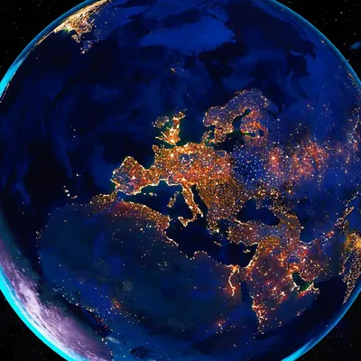 A rendering of the earth at nighttime with europe lit up by infrastructure.