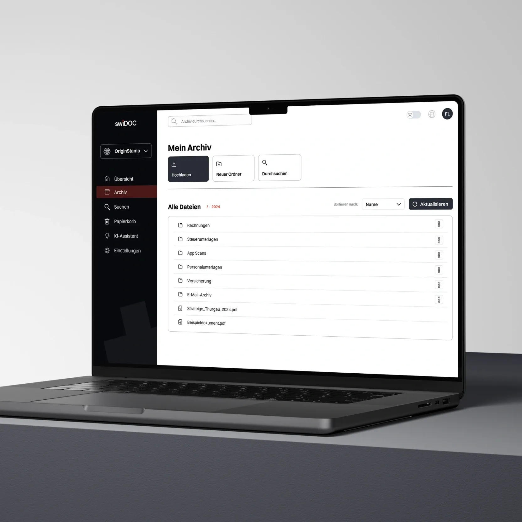 Laptop displays the home page of the “swiDOC” archiving software for Swiss SMEs.